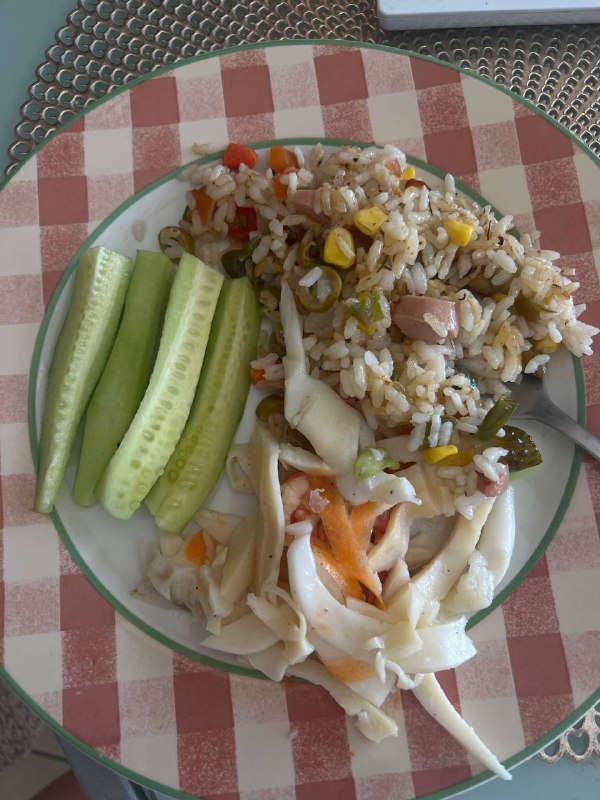 Fried Rice With Mixed Vegetables, Pickled Vegetables, And Cucumber Slices Plus Squid Salad