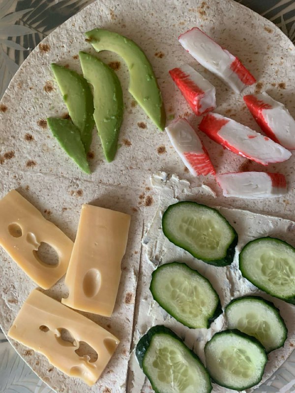 Tortilla Wrap With Avocado, Crab Sticks, Cheese, And Cucumber