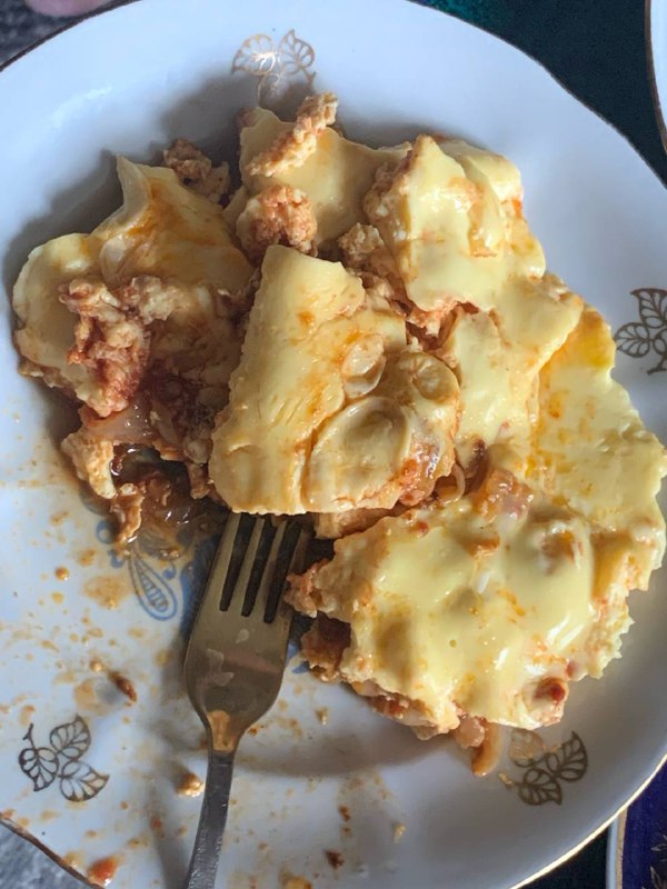 Scrambled Eggs With Cheese And Sauce