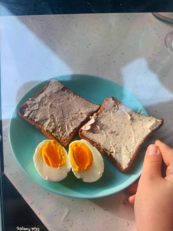 Toast With Butter And Boiled Egg