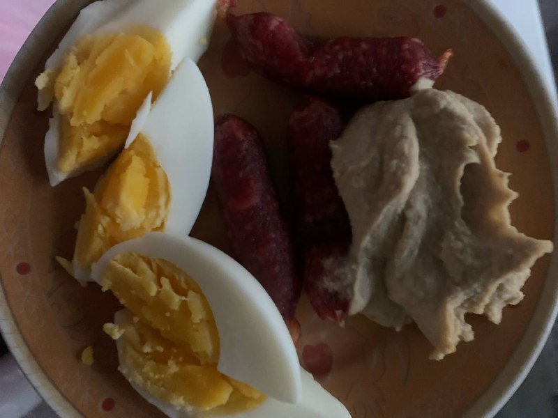 Boiled Eggs With Sausages And Hummus