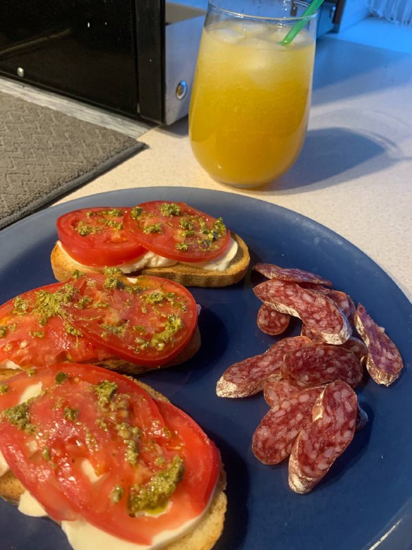 Tomato Bruschetta with Salami and Orange Juice