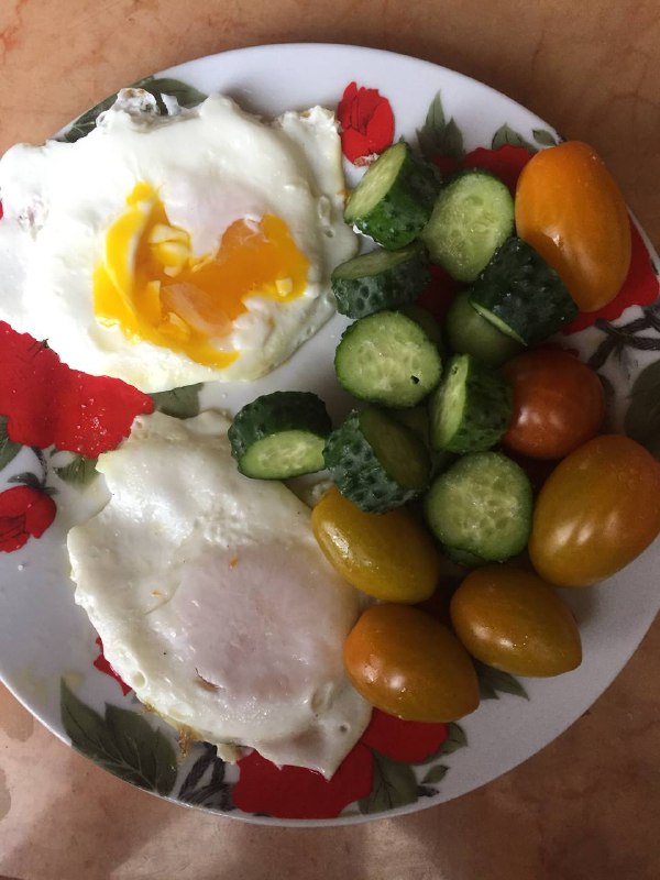 Fried Eggs With Cherry Tomatoes And Cucumber