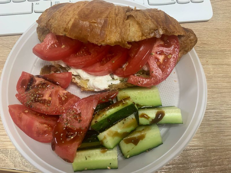 Tomato And Cheese Croissant Sandwich With Salad