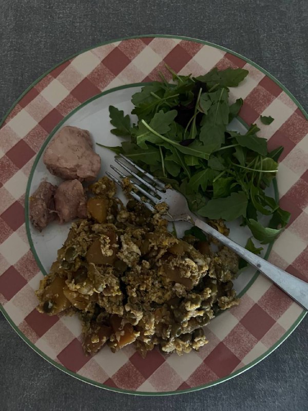 Scrambled eggs with mixed vegetables and side salad