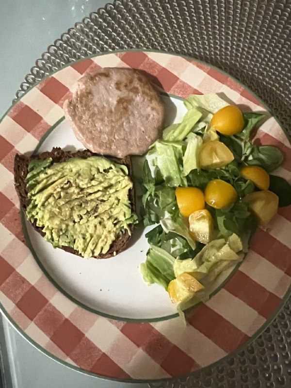 Avocado toast with turkey patty and salad