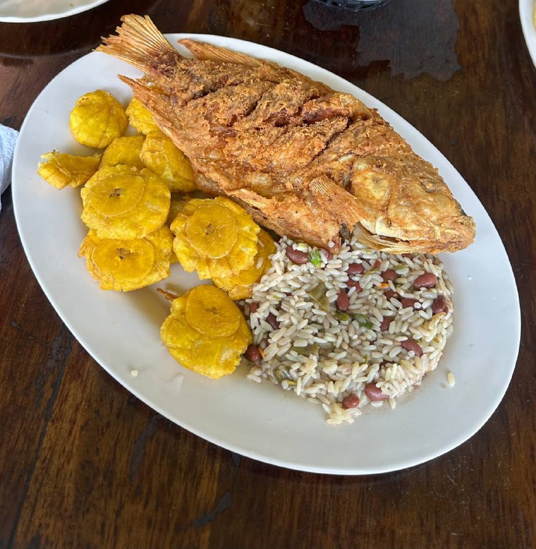 Fried fish with plantains and rice