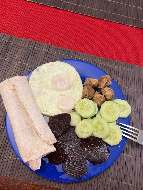 Egg And Wrap Plate With Vegetables And Tempeh