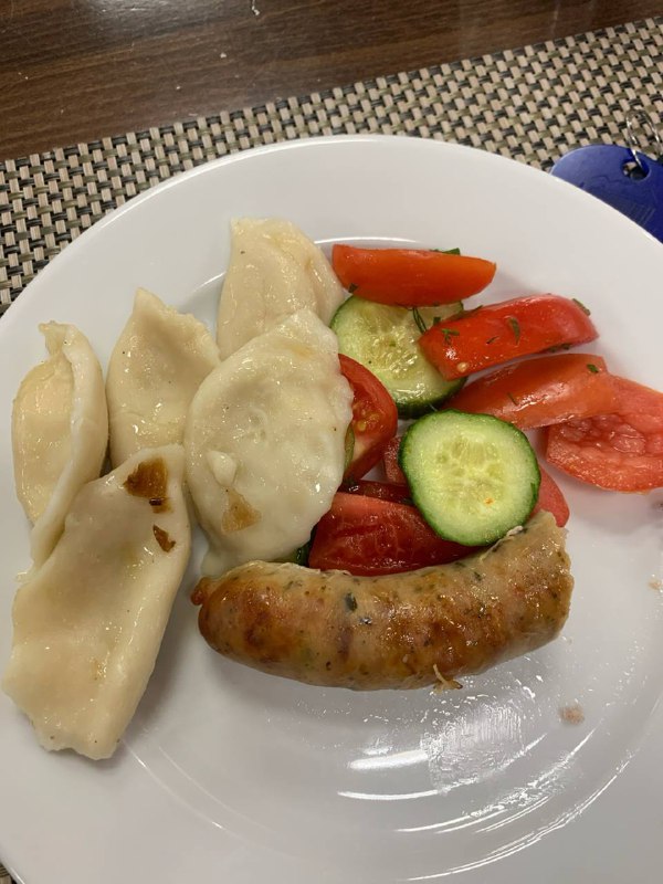 Dumplings With Sausage And Salad