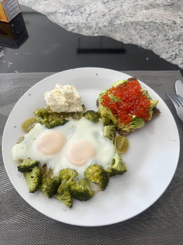 Eggs With Broccoli And Avocado Toast With Caviar